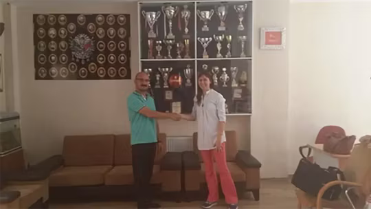 2015-QNET-HomePure two people shaking hands