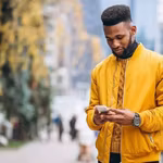 African entrepreneur on his phone