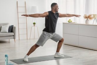 African man doing some stretches to stay healthy