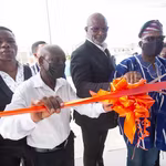 QNET officials cutting the ribbon at the opening of the Training Center in Ghana