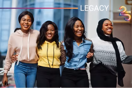 Group of African women with QNET 25th anniversary logo