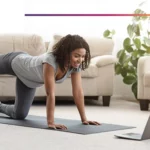 African lady doing exercice in front of her computer