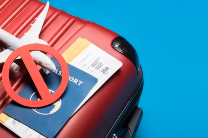 QNET contre la fraude aux voyages et les escroqueries liées aux visas