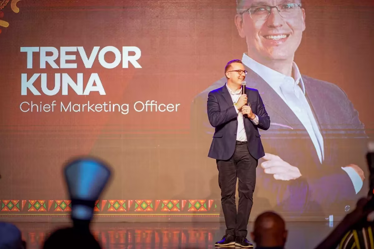 Trevor Kuna, Chief Marketing Officer for QNET on stage at V-Africa 2025 in Ghana