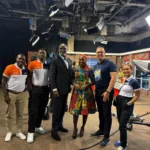 QNET Executives discussing V-Africa 2025 on tv in Ghana