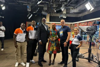 QNET Executives discussing V-Africa 2025 on tv in Ghana