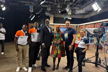 QNET Executives discussing V-Africa 2025 on tv in Ghana