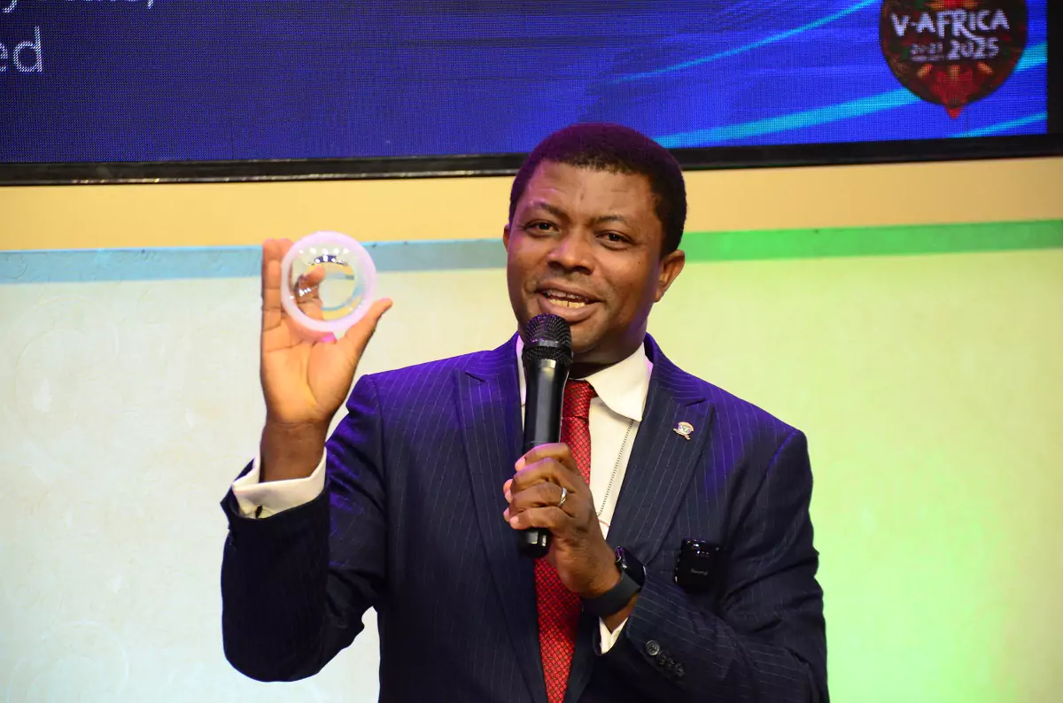 Professor Abiodun at Covenant University with the Amezcua Bio Disc 3 in hand