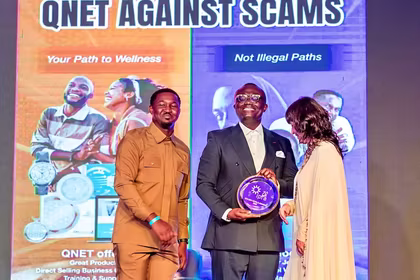 QNET receiving their award at IPRA ceremony in Ghana